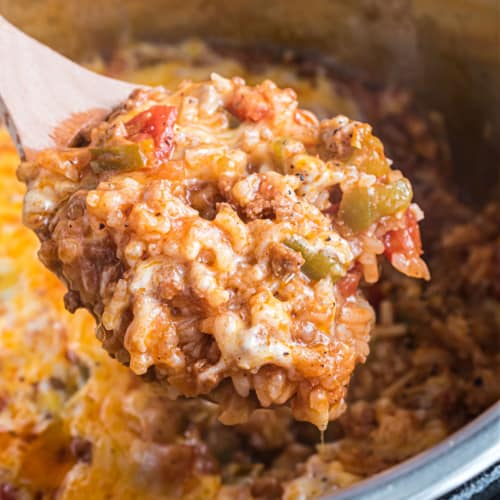 Looking for a delicious, easy weeknight dinner idea? This Instant Pot Stuffed Pepper Casserole recipe is the perfect comfort food, and ready in under 30 minutes! Tender rice, ground beef, a thick tomato sauce and lots of cheese make family classic a favorite!