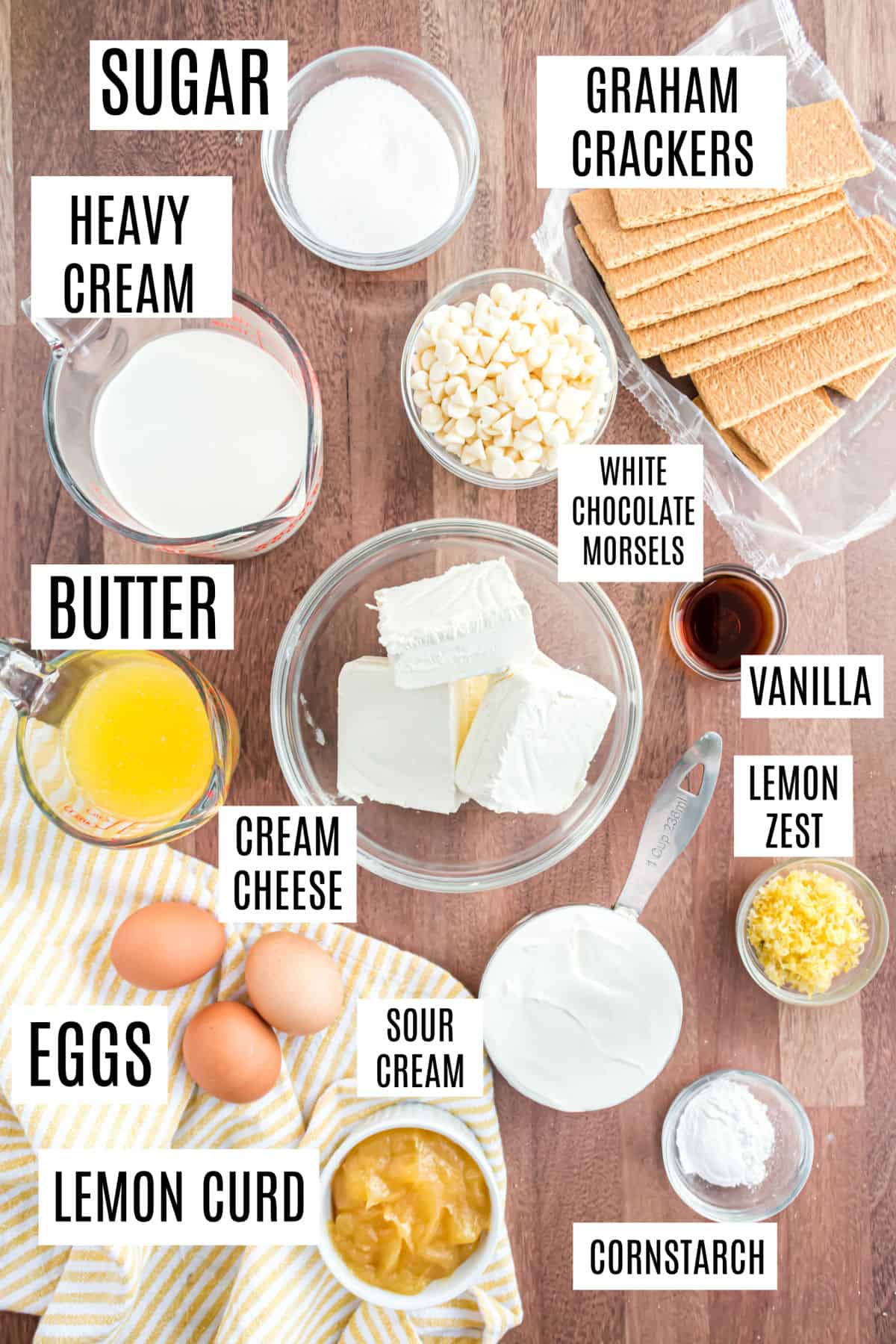 Ingredients needed to make lemon cheesecake.