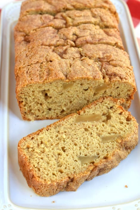 Loaf of Apple Pie Bread sliced on a white plate