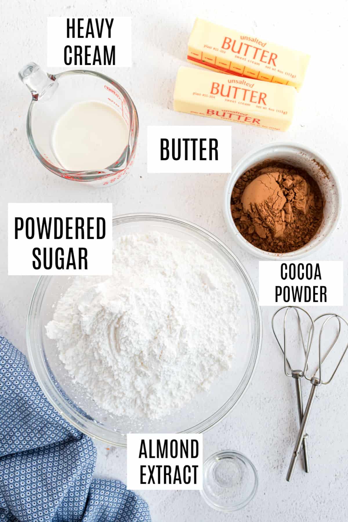 Ingredients needed to make homemade buttercream frosting with chocolate.