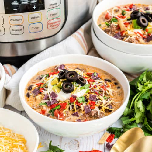 This Easy Instant Pot Taco Soup Recipe is the perfect weeknight dinner idea. Packed with bold Tex-Mex flavor, your family is going to ask for this again and again!