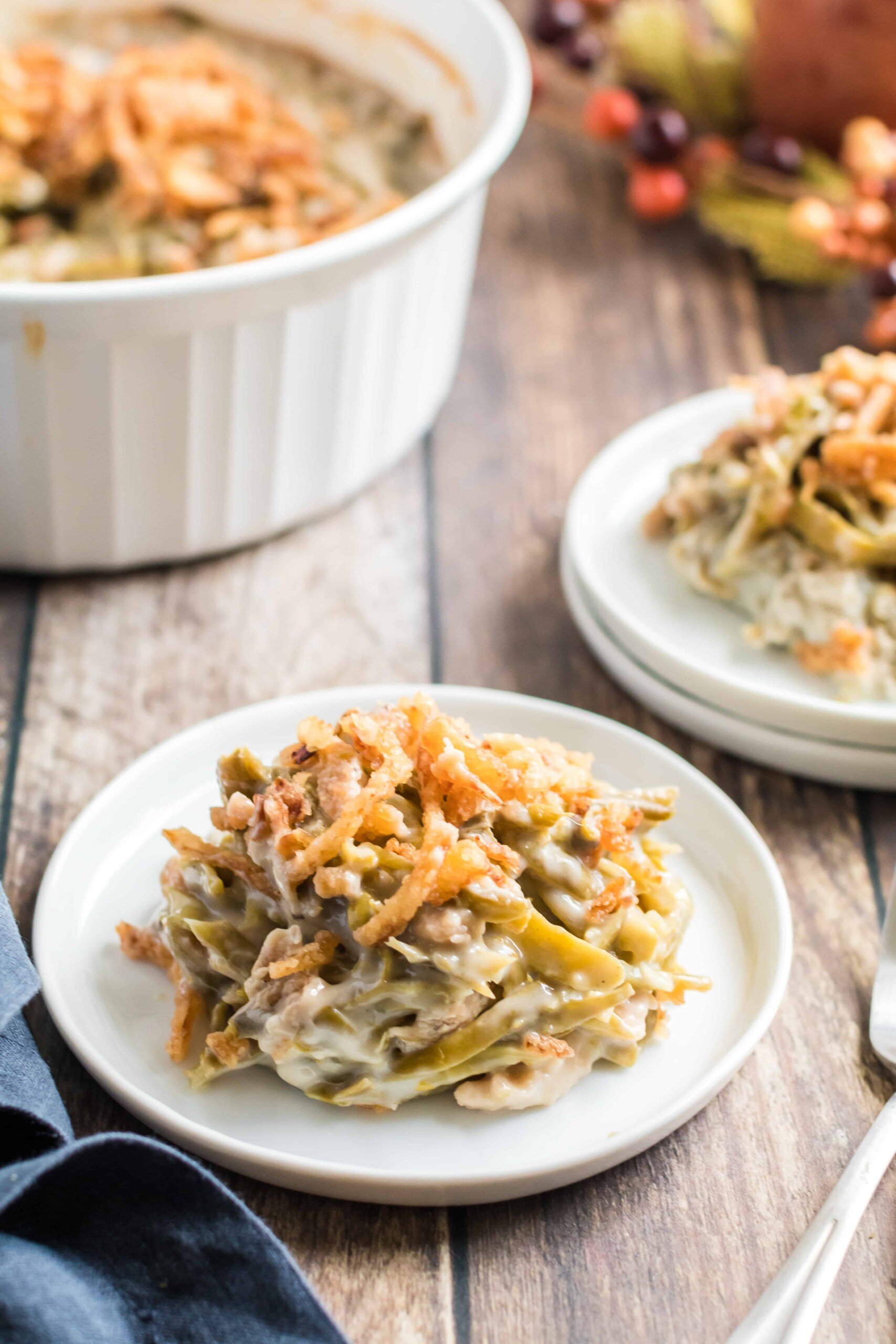 Two plates of green bean casserole.