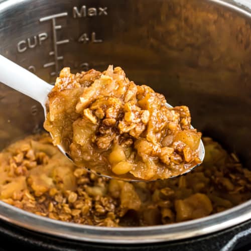 Easy Instant Pot Apple Crisp is made in minutes! Caramelized apples with a sweet, crisp topping is the perfect fall dessert recipe!