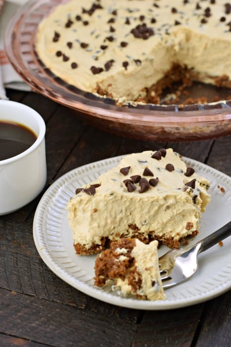Easy No Bake Pumpkin Chocolate Chip Cheesecake with bite taken out.