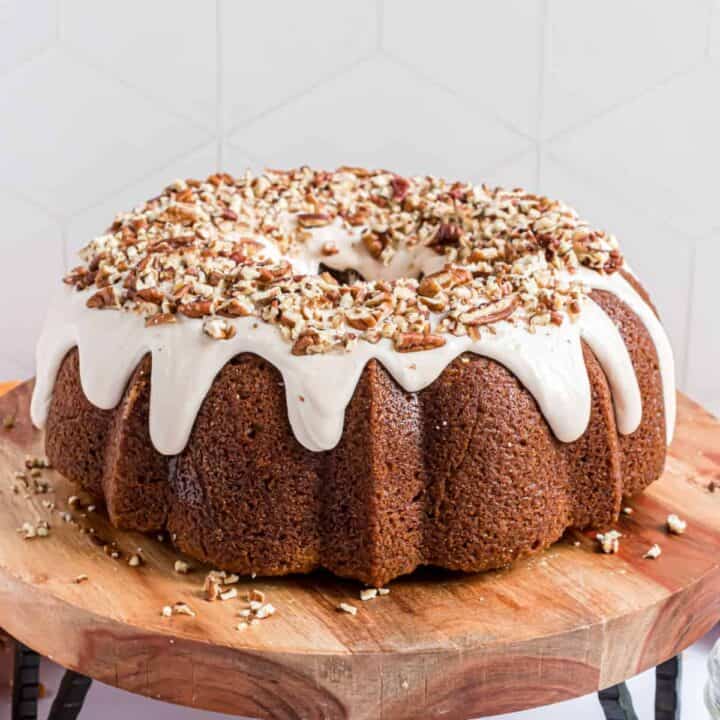 Pumpkin Bundt Cake gets even better when you fill it with cream cheese! A hint of maple and warming spices will have you ready to pull on your coziest sweater and watch the leaves fall.