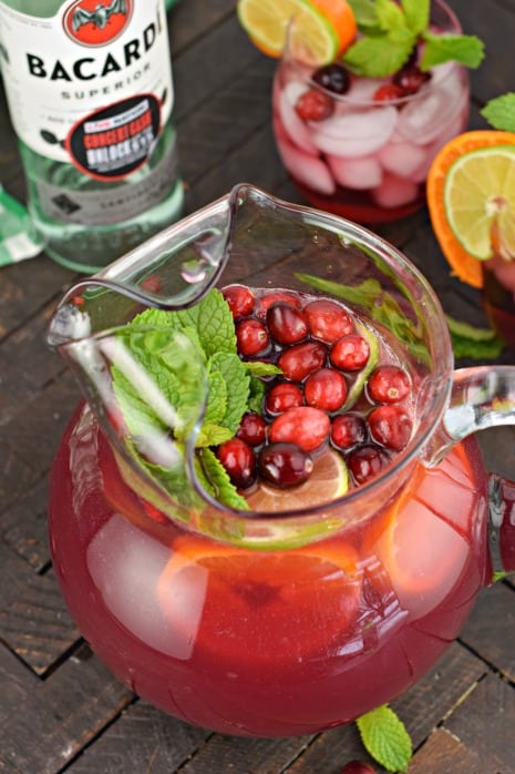 Easy, fun and fruity, Christmas Punch recipe. This holiday drink is flavored with cranberry, orange, lime, and my secret ingredient, almond extract! Add rum for a festive spiked cocktail.