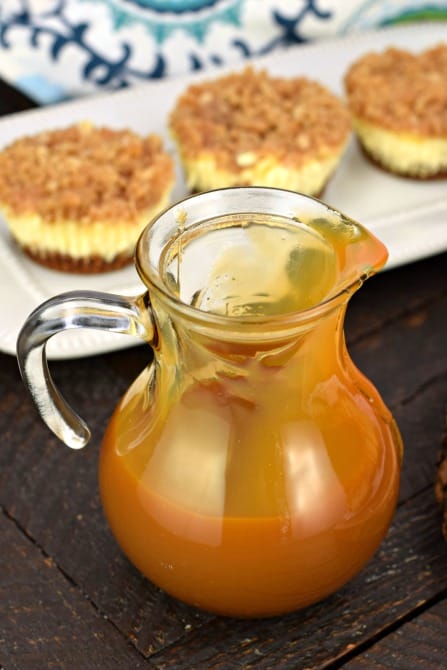 Glass pitcher with caramel sauce.