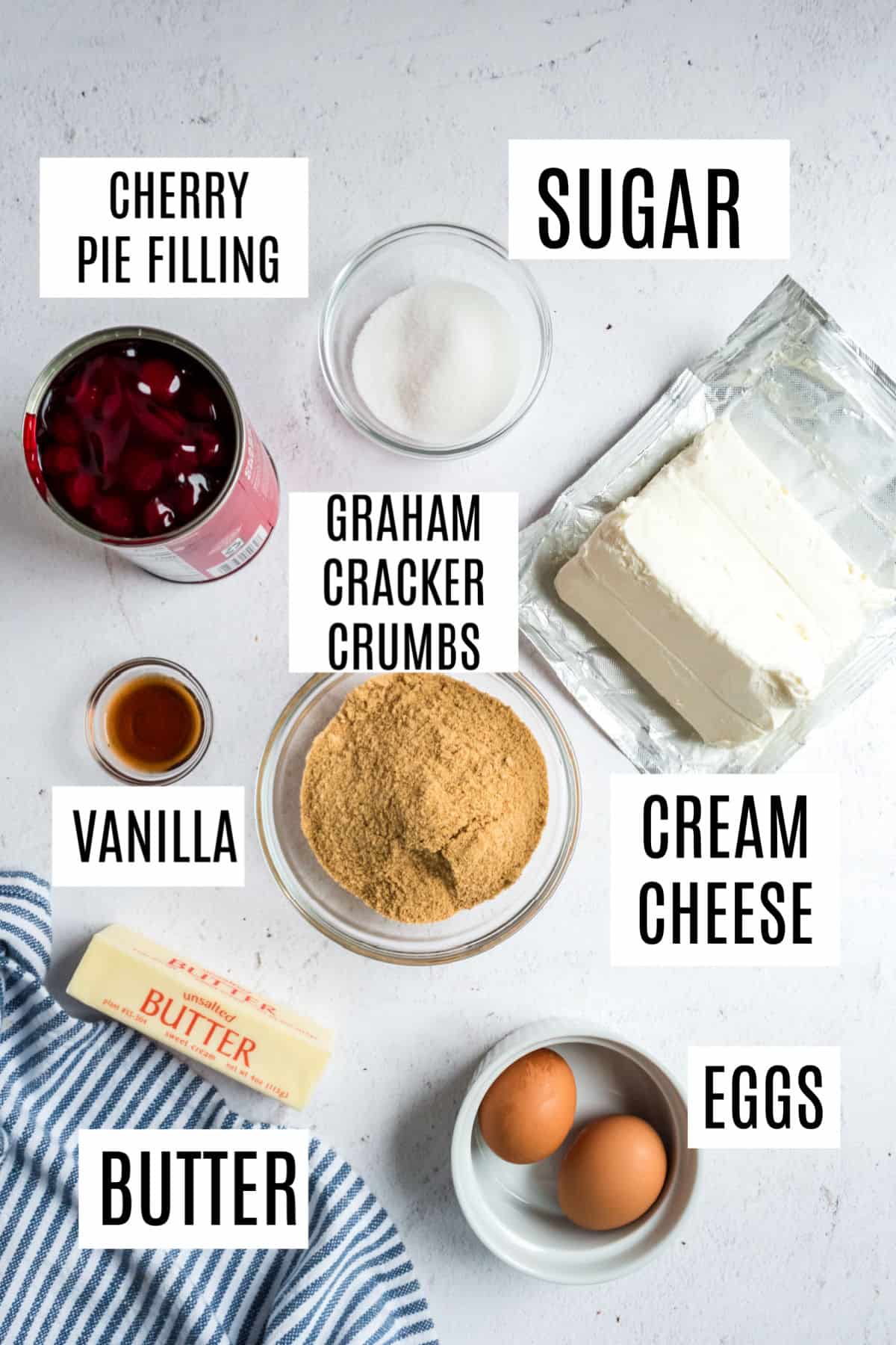 Ingredients needed to make mini cherry cheesecakes.