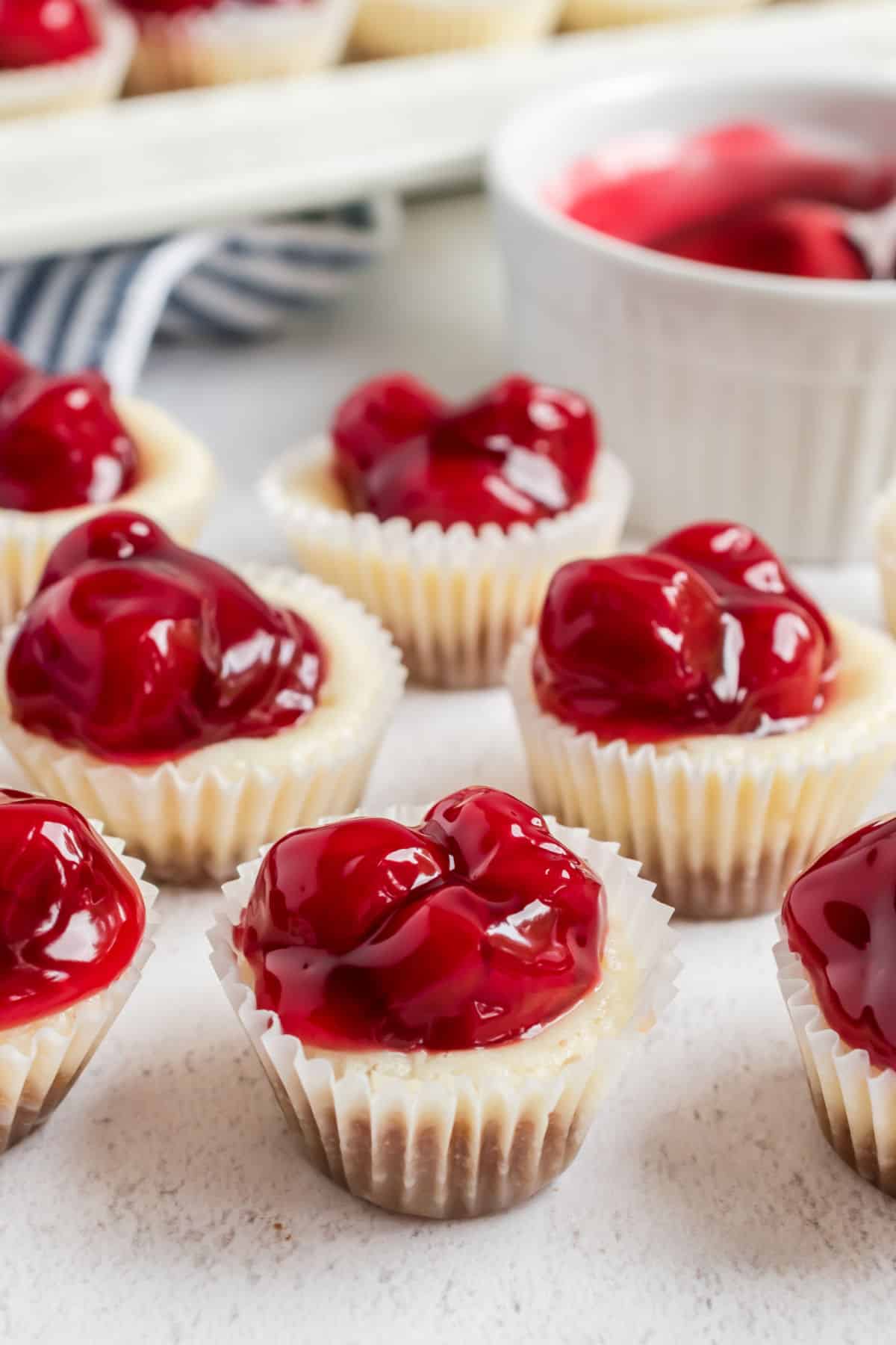 https://www.shugarysweets.com/wp-content/uploads/2019/11/mini-cherry-cheesecakes.jpg