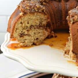 Pecan Pie Bundt cake with pecan filling and topping.