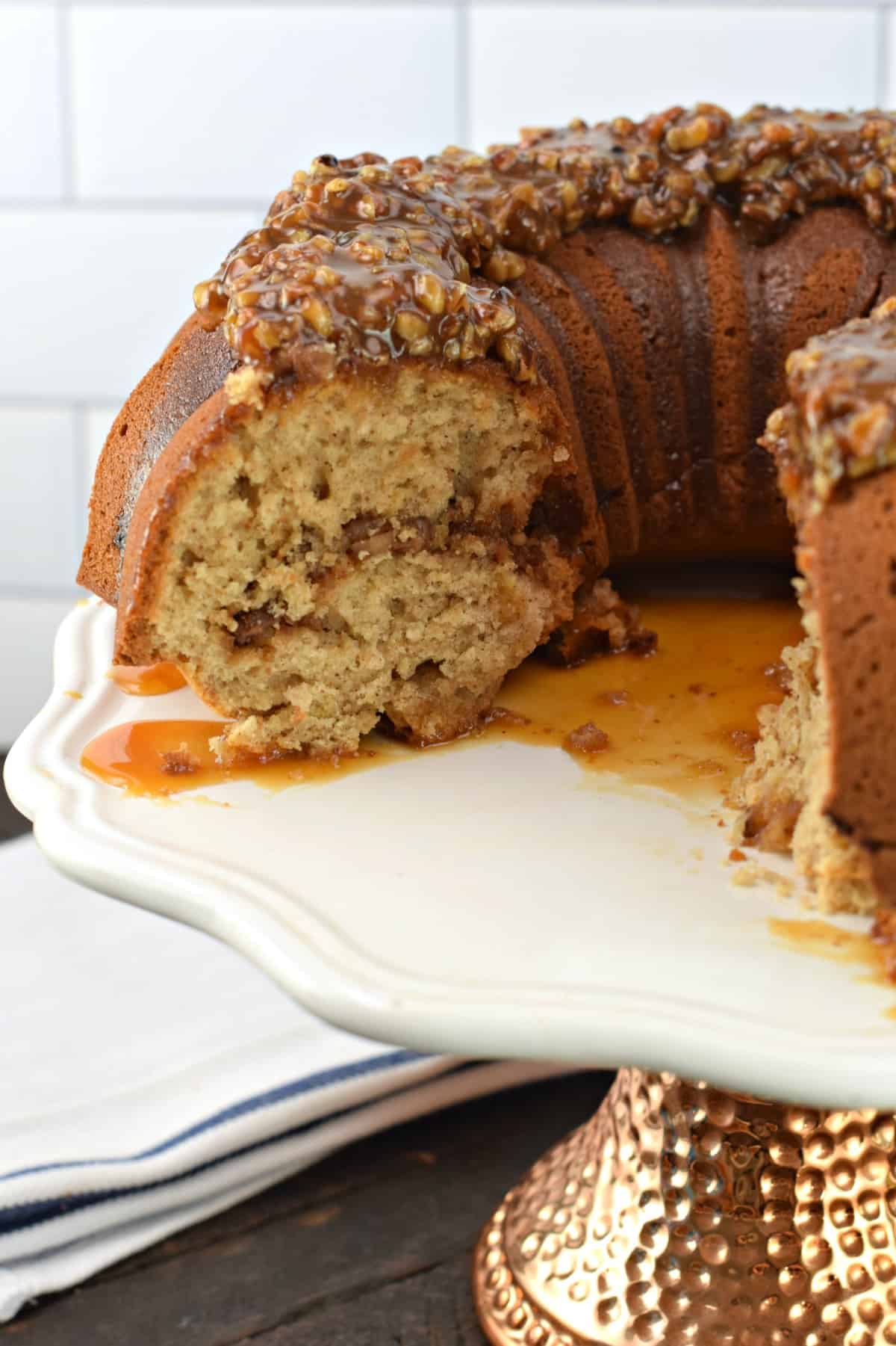 Pecan Pie Bundt cake with pecan filling and topping.