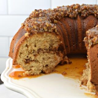 Bundt cake with pecan pie filling and topping.