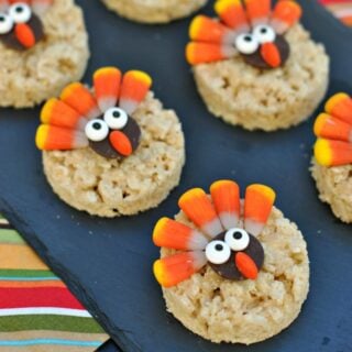 Easy to assemble Turkey Rice Krispie Treats decorated for Thanksgiving! Soft and chewy krispie treats with an adorable turkey topping! Let the kids help create their own!