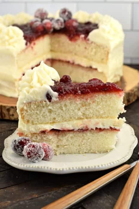 White layered cake with cranberry filling.