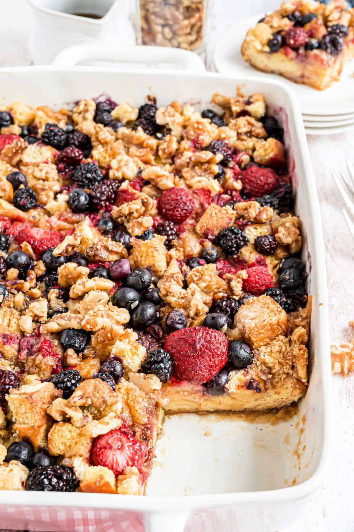 Step by step photos showing how to make berry french toast.