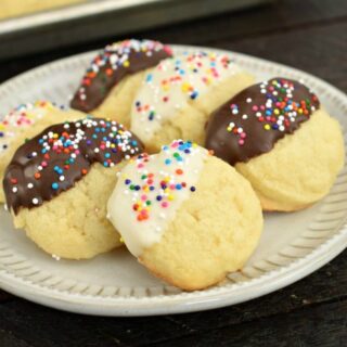 Butter cookies on white plate.