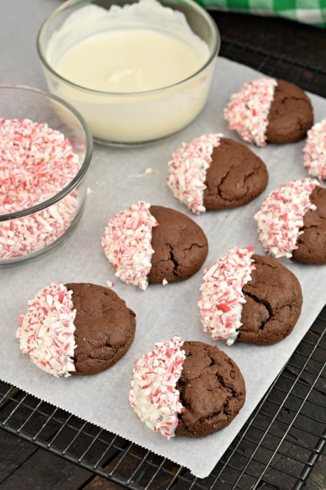 White chocolate dipped chocolate cookies with crushed peppermint candy canes.