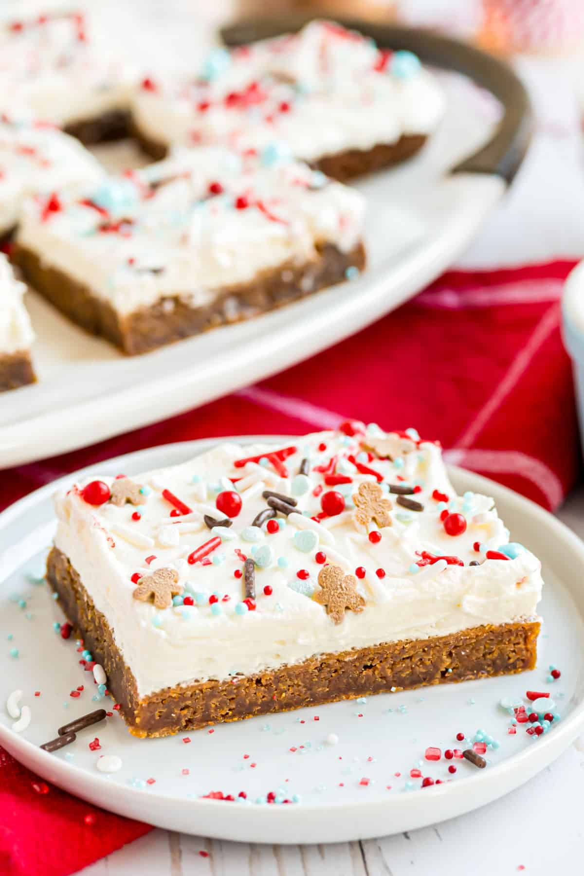 Gingerbread cookie bar served on a white plate.