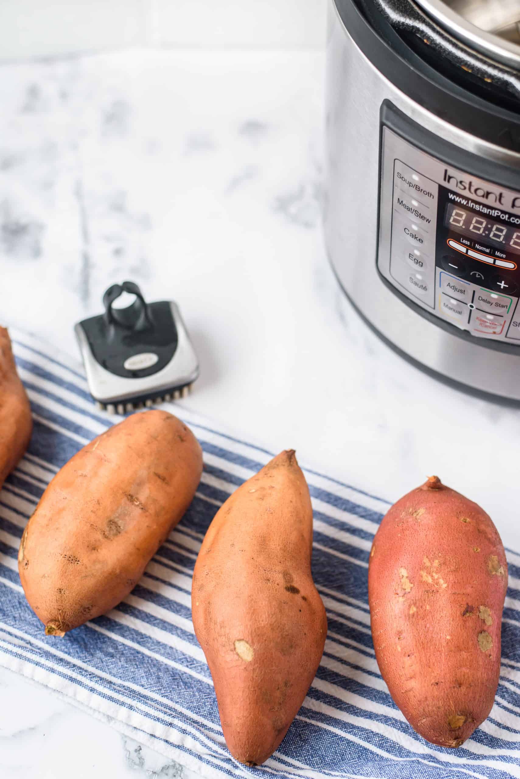 Learn how to make easy and delicious Sweet Potatoes in the Instant Pot. Creamy and perfect, and better than oven baked sweet potatoes!