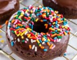 Baked chocolate donut with sprinkles.