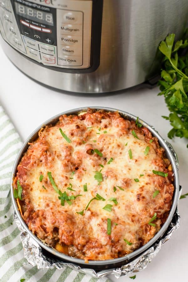 Instant Pot Lasagna in a springform pan wrapped in foil