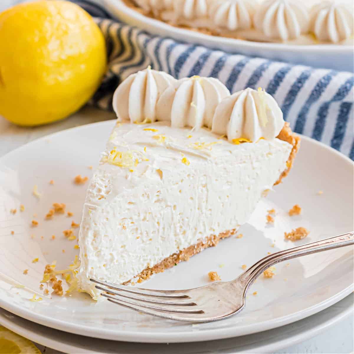 Slice of no bake cheesecake with lemon.