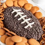 Cookies and cream cheese ball shaped like a football for game day.