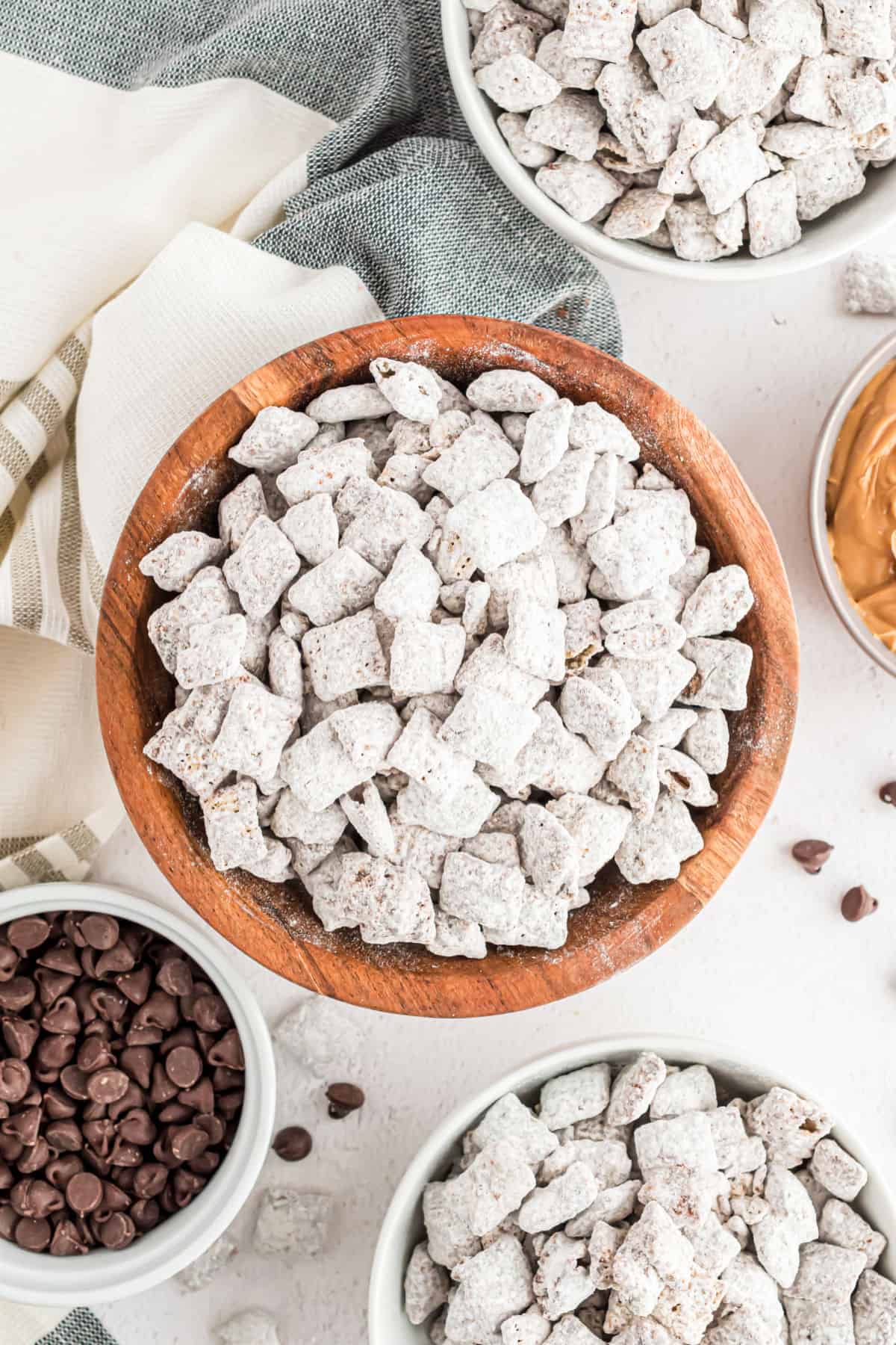Wooden bowl filled with puppy chow.