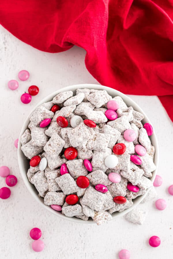 Valentine puppy chow in a white bowl.