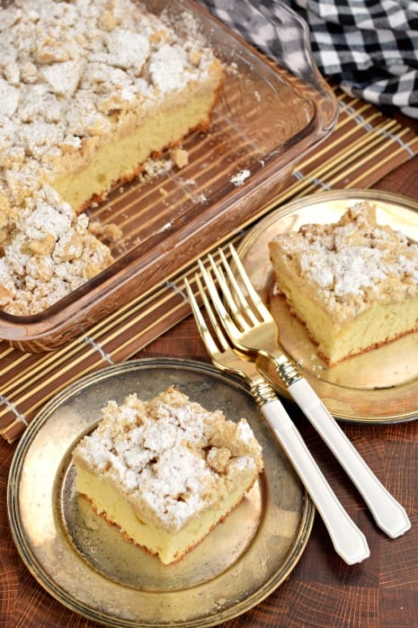 Top view of two slices of crumb cake with two forks.