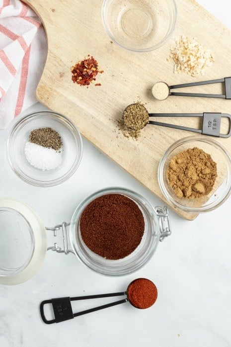 Ingredients measured out for homemade taco seasoning.