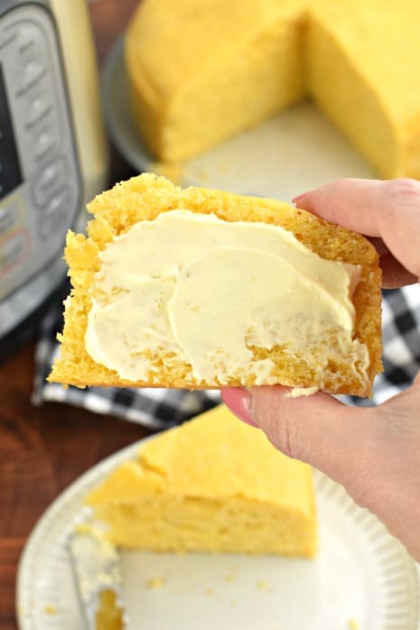 Slice of corn bread with butter.