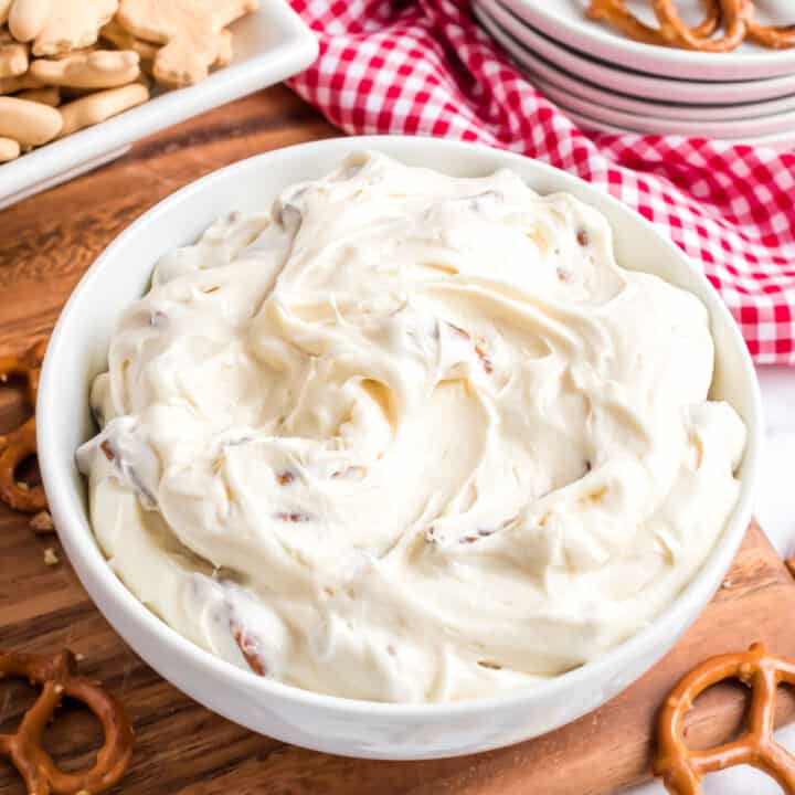 Is it a cheesecake? Is it a dip? It's both! Cheesecake Dip brings all the taste of good cheesecake to a creamy dessert dip. Served with cookies, fruit, or Graham crackers, this recipe will rock your next dessert bar!