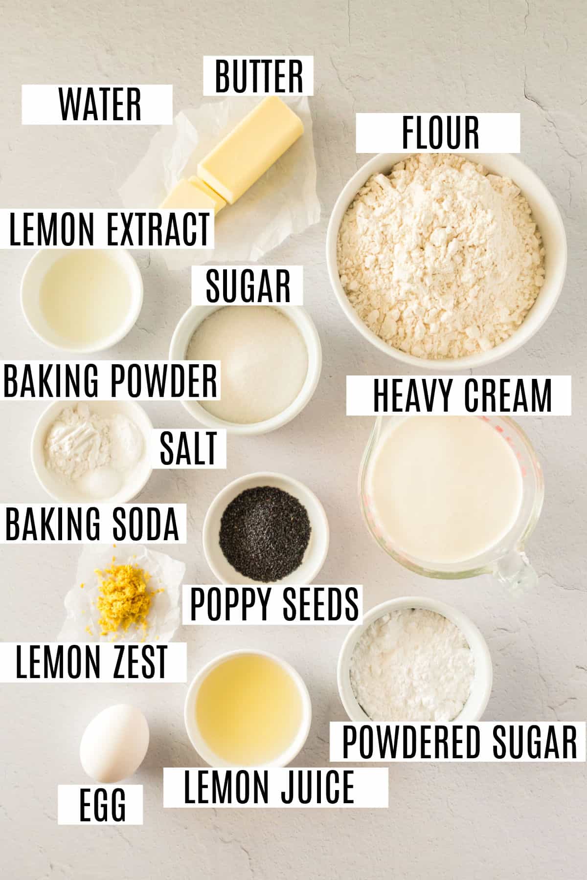 Ingredients needed to make lemon scones with poppy seeds.