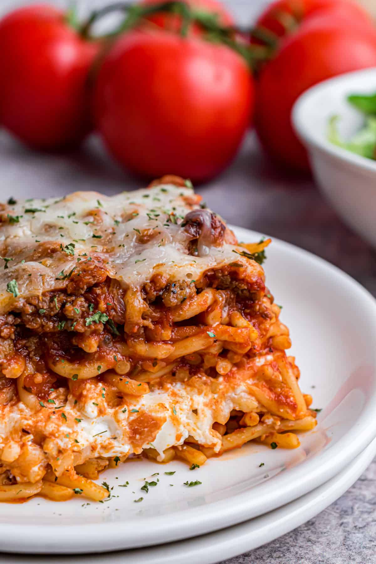 Close up of layers in spaghetti casserole recipe.