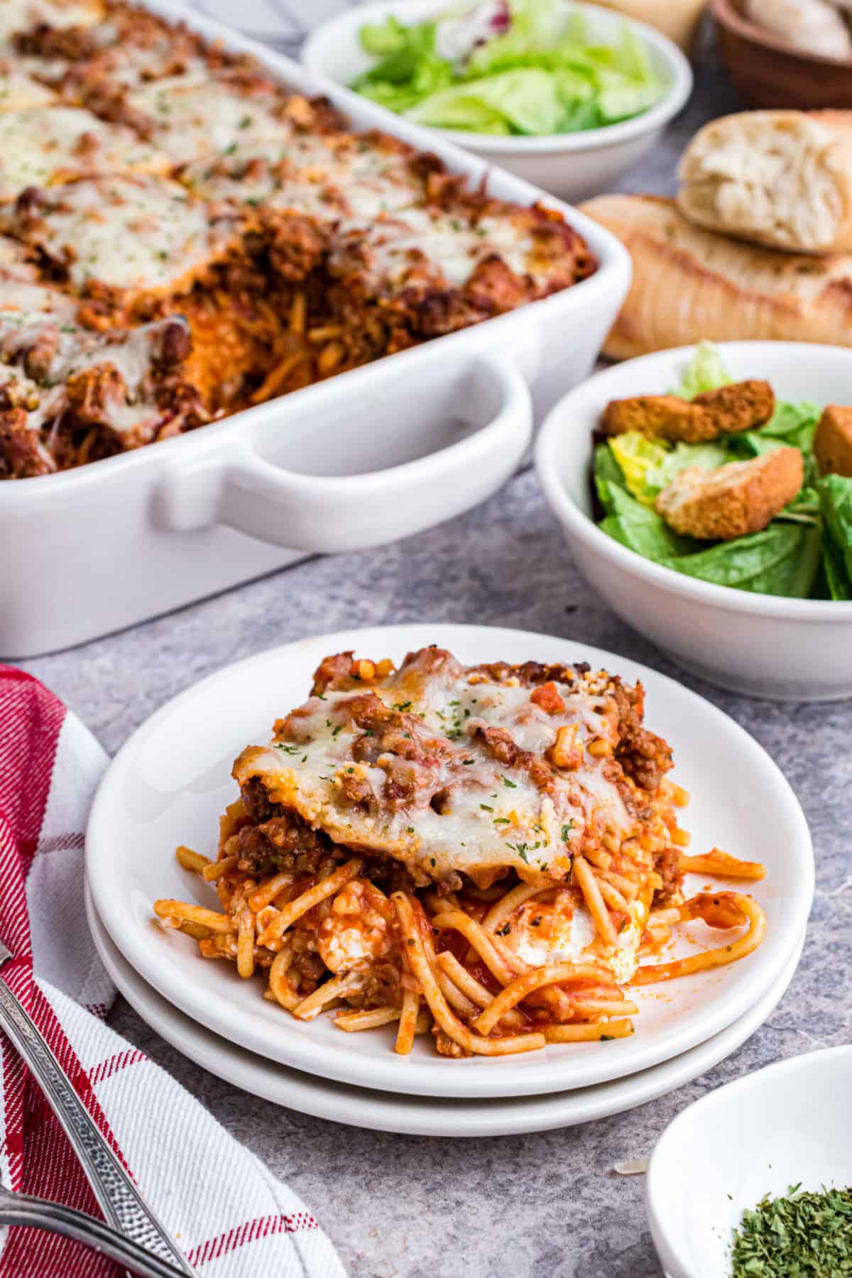 Million dollar casserole served on a plate.