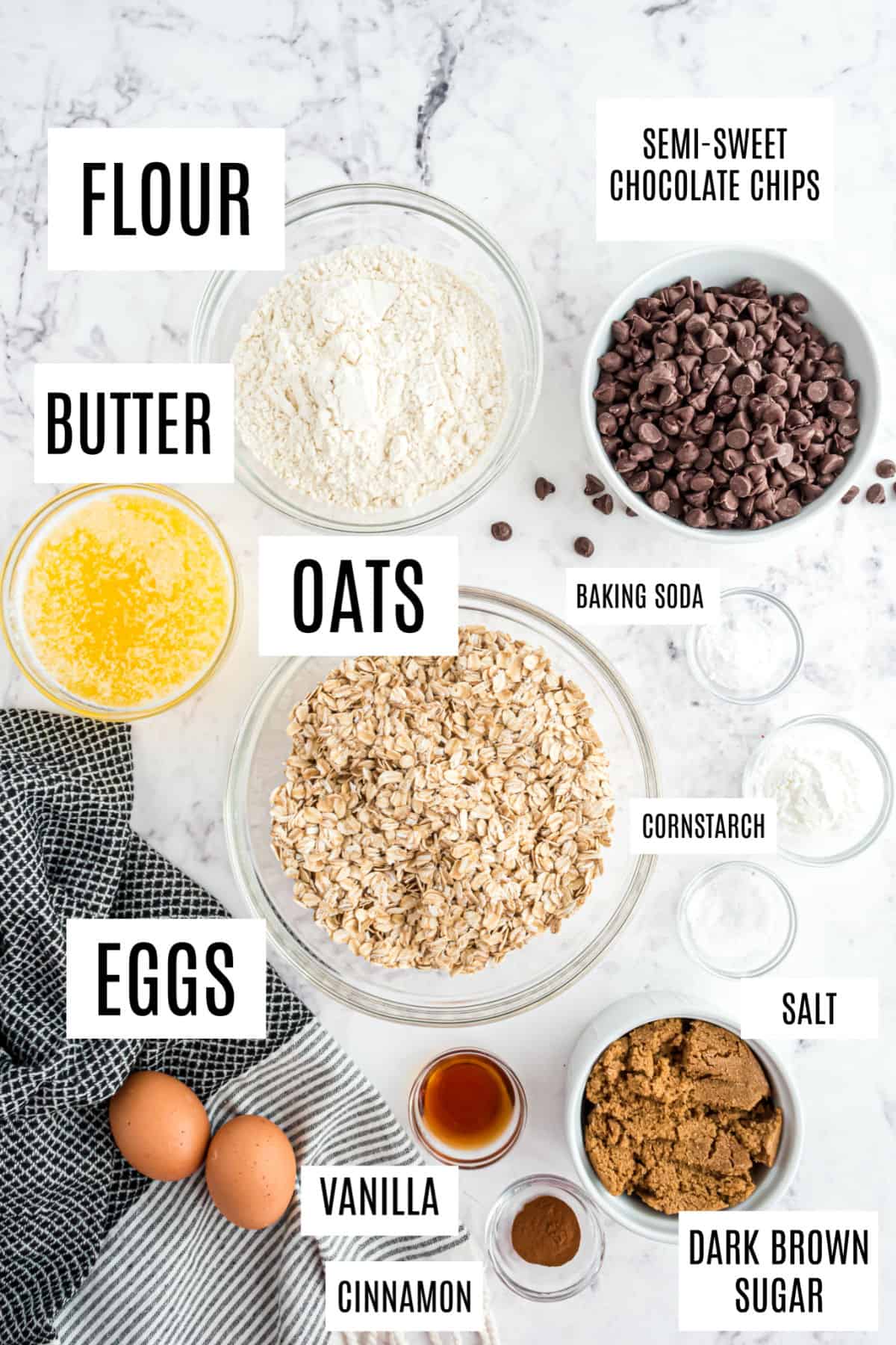 Ingredients needed for oatmeal chocolate chip cookies including butter and old fashioned oats.