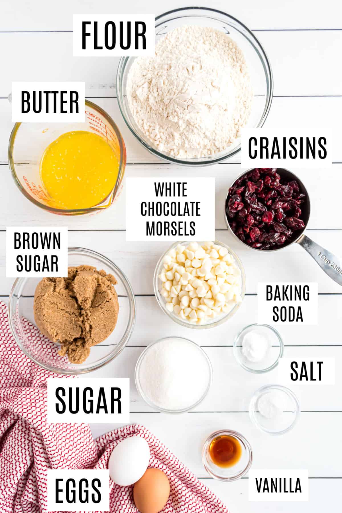 Ingredients needed to make white chocolate cranberry cookies.
