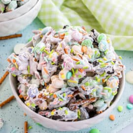 Bunny chow candy in a bowl with pastel sprinkles.