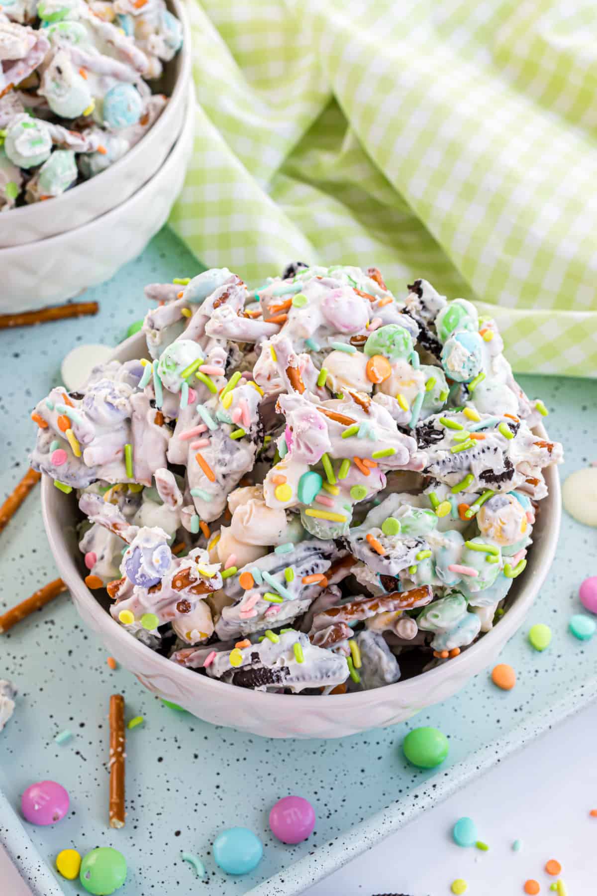 Bunny chow candy in a bowl with pastel sprinkles.