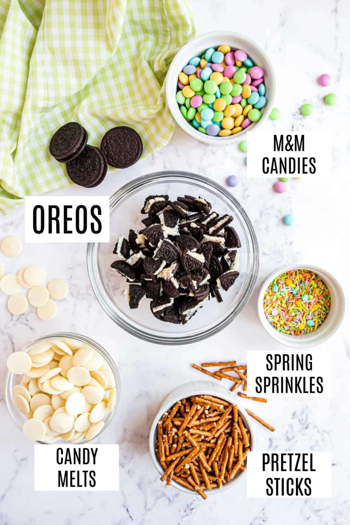 Ingredients needed for bunny chow candy, including Oreos and pretzels.