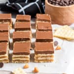 Decadent peanut butter bars made with cracker crumbs are oozing with rich caramel and chocolate! Caramel Cracker Bars are just the treat to bring a little bit of sweetness to your day.