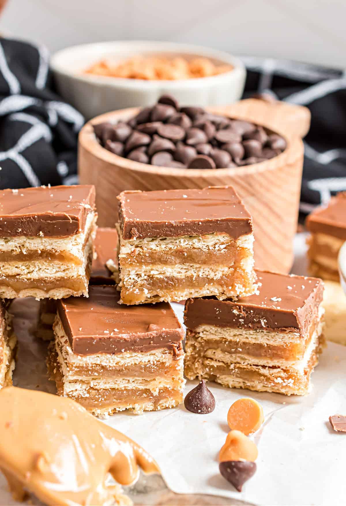 Cracker candy stacked on parchment paper.