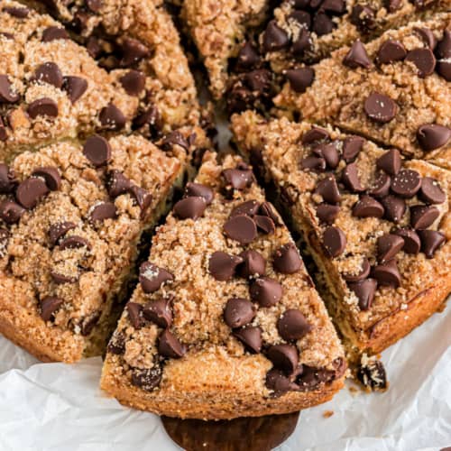 Chocolate chip coffee cake cut into slices.