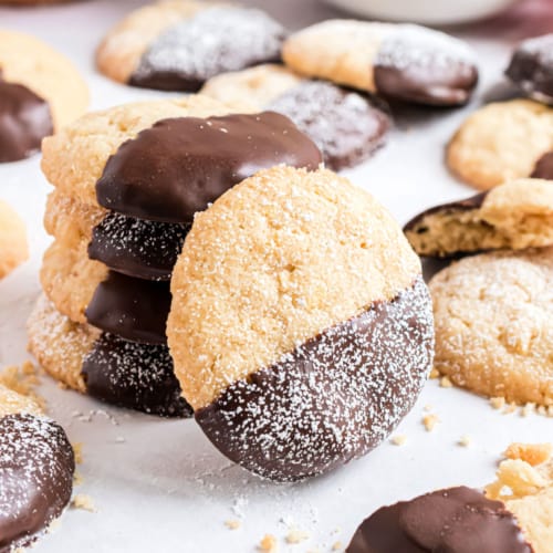Sweet and salty potato chip cookies made even better with a dip into melted chocolate. You've never tasted anything like Chocolate Dipped Potato Chip Cookies!