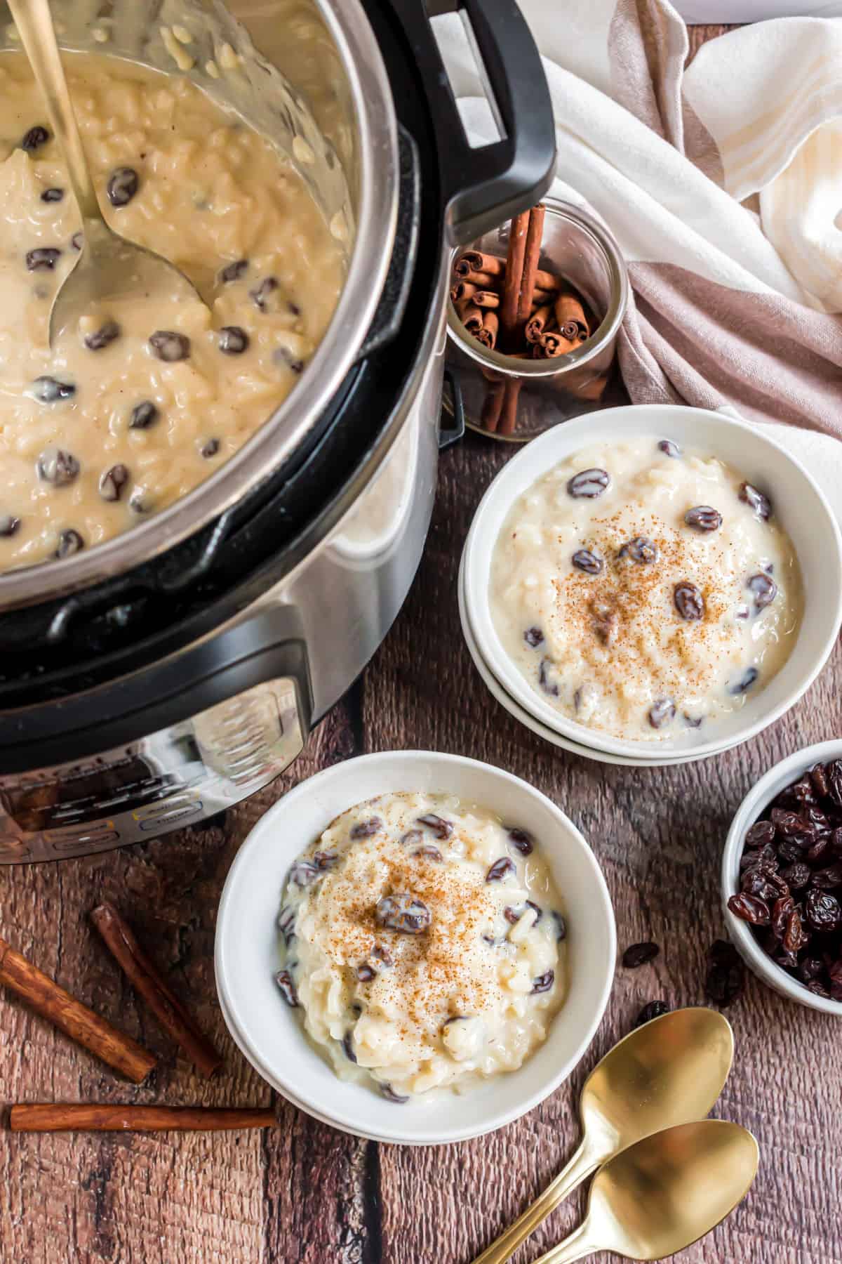 Rice pudding served in white bowls.