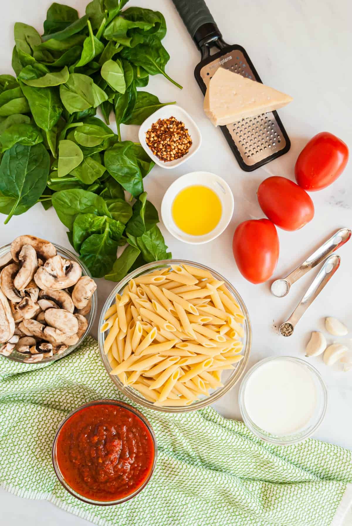 Picture of all the ingredients needed to make penne rosa.