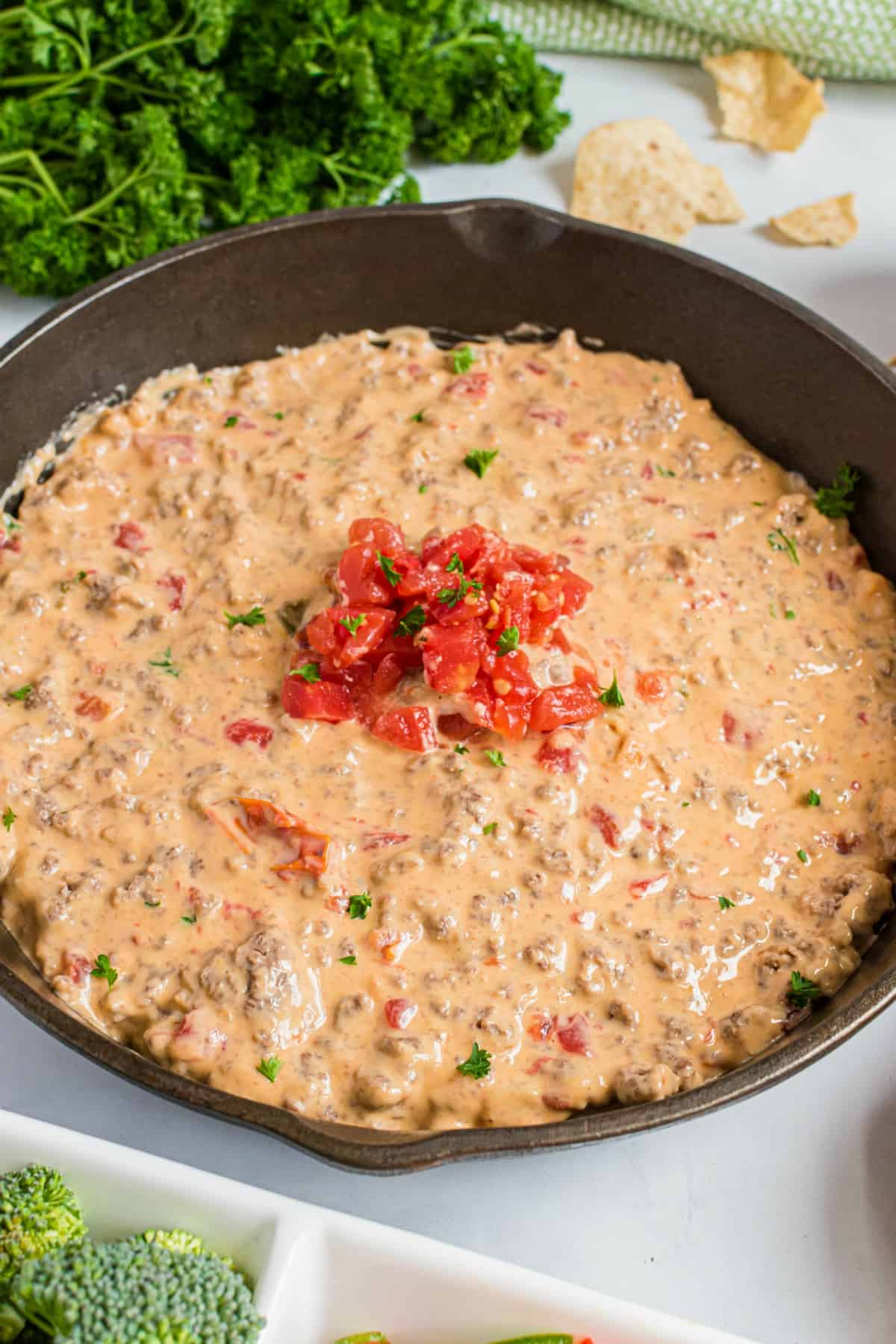 Cast iron skillet with rotel dip.