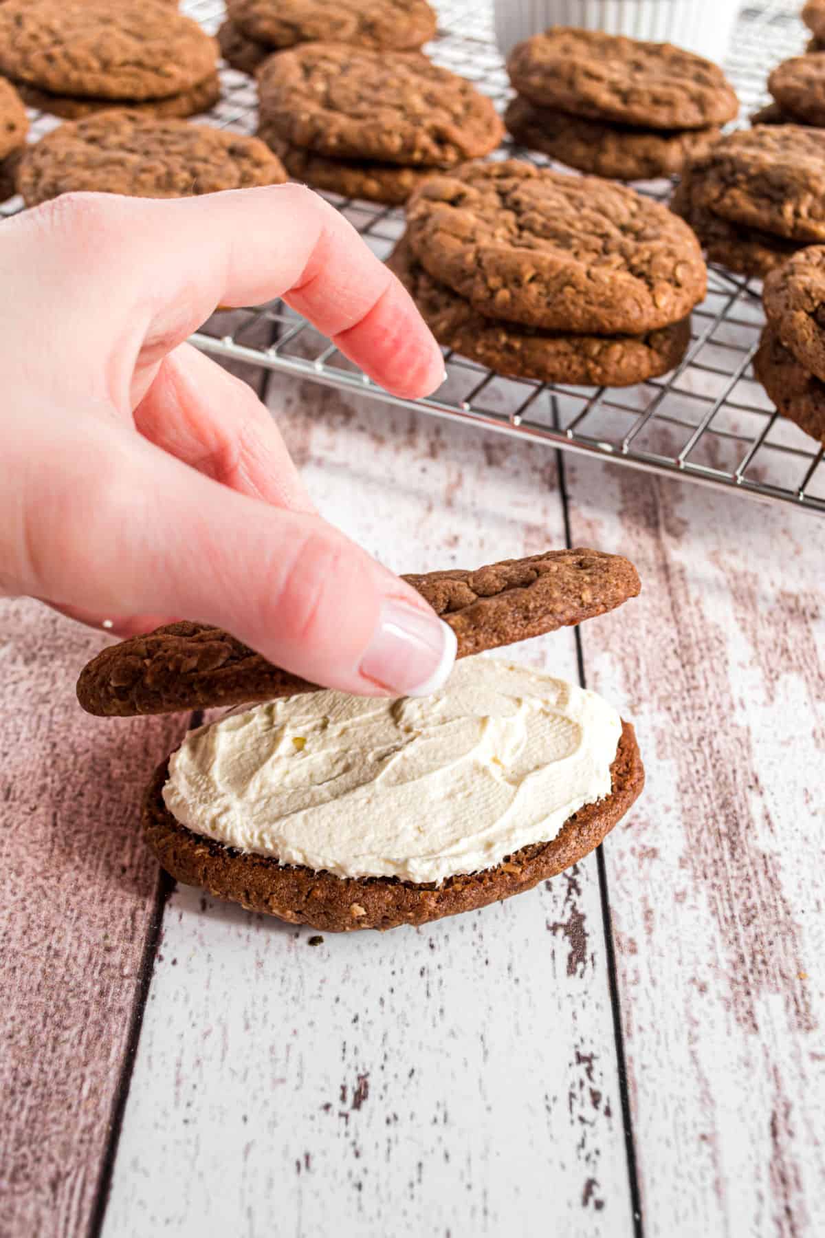 Chocolate oatmeal cookies with cream filling.