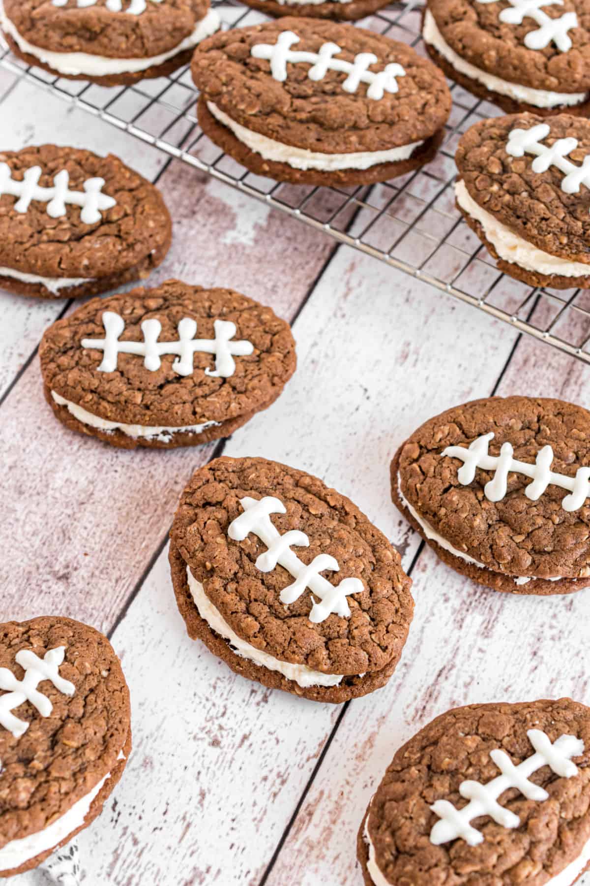 Little debbie homemade chocolate oatmeal cream pies with icing to resemble footballs.